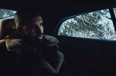 Image of the rapper Drake sitting in a car