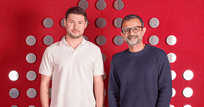 Sony Music India and The Hello Group executives shaking hands to announce a new global partnership focused on Indian talent.