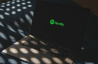 Spotify and Universal Music Group partner on AI-powered remix and cover features featuring artists like Taylor Swift and Drake.